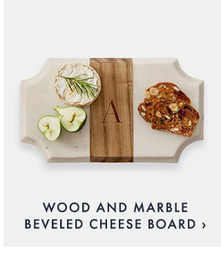 WOOD AND MARBLE BEVELED CHEESE BOARD ›