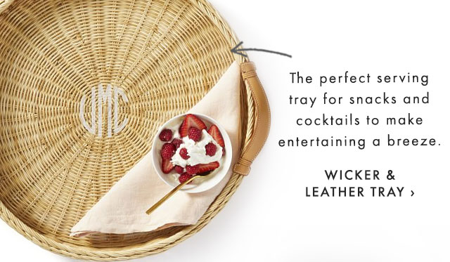 The perfect serving tray for snacks and cocktails to make entertaining a breeze. - WICKER & LEATHER TRAY ›