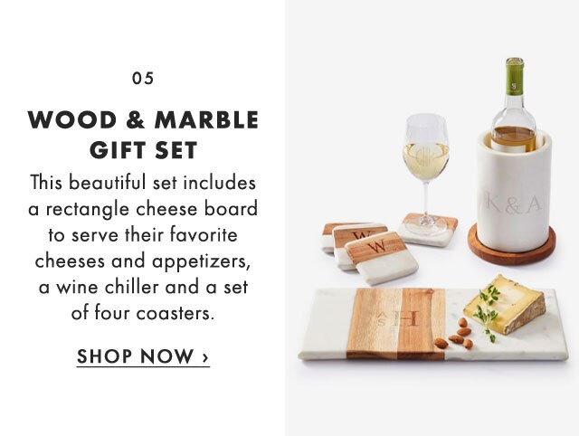 05. WOOD & MARBLE GIFT SET - This beautiful set includes a rectangle cheese board to serve their favorite cheeses and appetizers, a wine chiller and a set of four coasters. - SHOP NOW ›