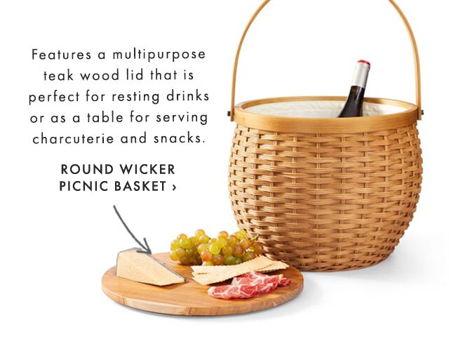Features a multipurpose teak wood lid that is perfect for resting drinks or as a table for serving charcuterie and snacks. - ROUND WICKER PICNIC BASKET ›