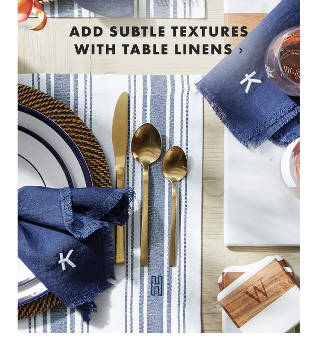 ADD SUBTLE TEXTURES WITH TABLE LINENS ›