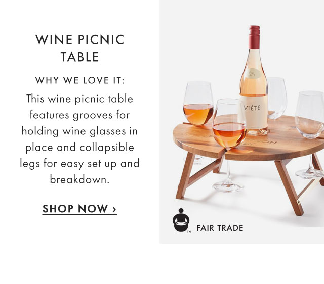 WINE PICNIC TABLE - WHY WE LOVE IT: This wine picnic table features grooves for holding wine glasses in place and collapsible legs for easy set up and breakdown. - SHOP NOW ›