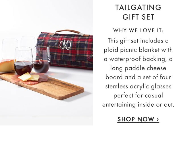 TAILGATING GIFT SET - WHY WE LOVE IT: This gift set includes a plaid picnic blanket with a waterproof backing, a long paddle cheese board and a set of four stemless acrylic glasses perfect for casual entertaining inside or out. - SHOP NOW ›
