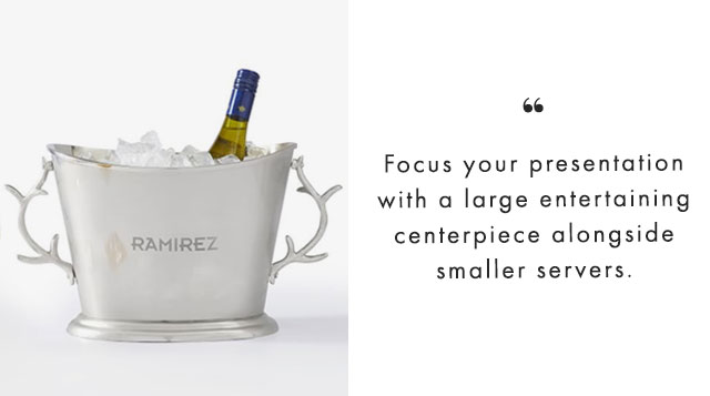 Focus your presentation with a large entertaining centerpiece alongside smaller servers.