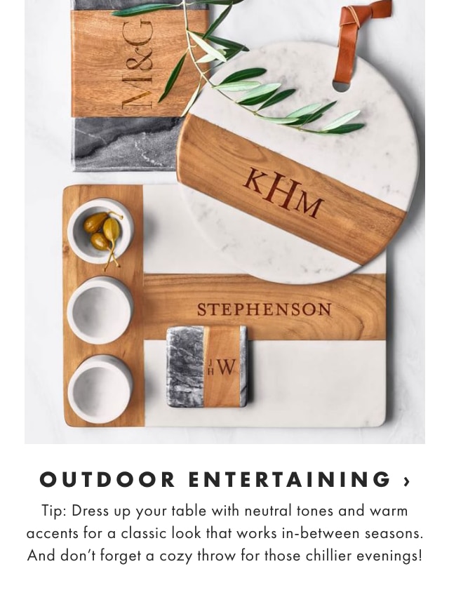 Outdoor Entertaining › Tip: Dress up your table with neutral tones and warm accents for a classic look that works in-between seasons. And don’t forget a cozy throw for those chillier evenings!