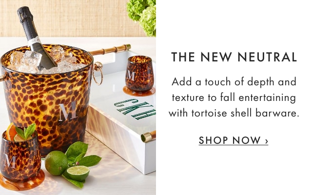 THE NEW NEUTRAL - Add a touch of depth and texture to fall entertaining with tortoise shell barware. - SHOP NOW ›