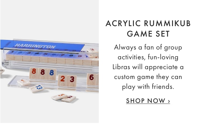 ACRYLIC RUMMIKUB GAME SET - Always a fan of group activities, fun-loving Libras will appreciate a custom game they can play with friends. - SHOP NOW ›