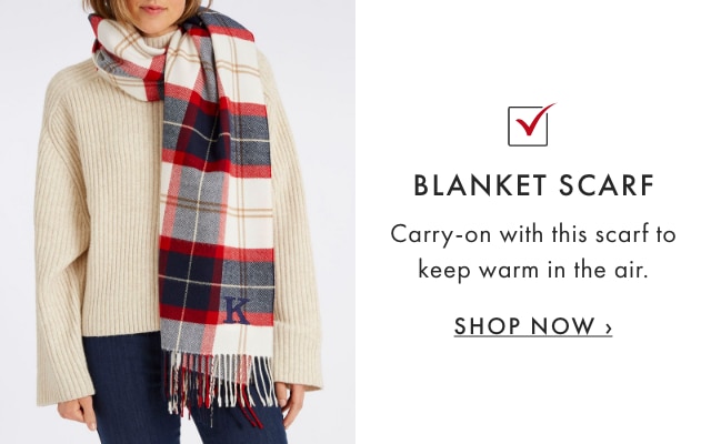 BLANKET SCARF - Carry-on with this scarf to keep warm in the air. - SHOP NOW ›