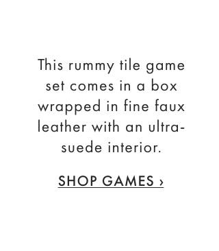 This rummy tile game set comes in a box wrapped in fine faux leather with an ultra-suede interior. - SHOP GAMES &rsaquo;
