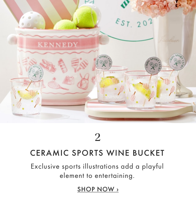 2. CERAMIC SPORTS WINE BUCKET - Exclusive sports illustrations add a playful element to entertaining. - SHOP NOW &rsaquo;